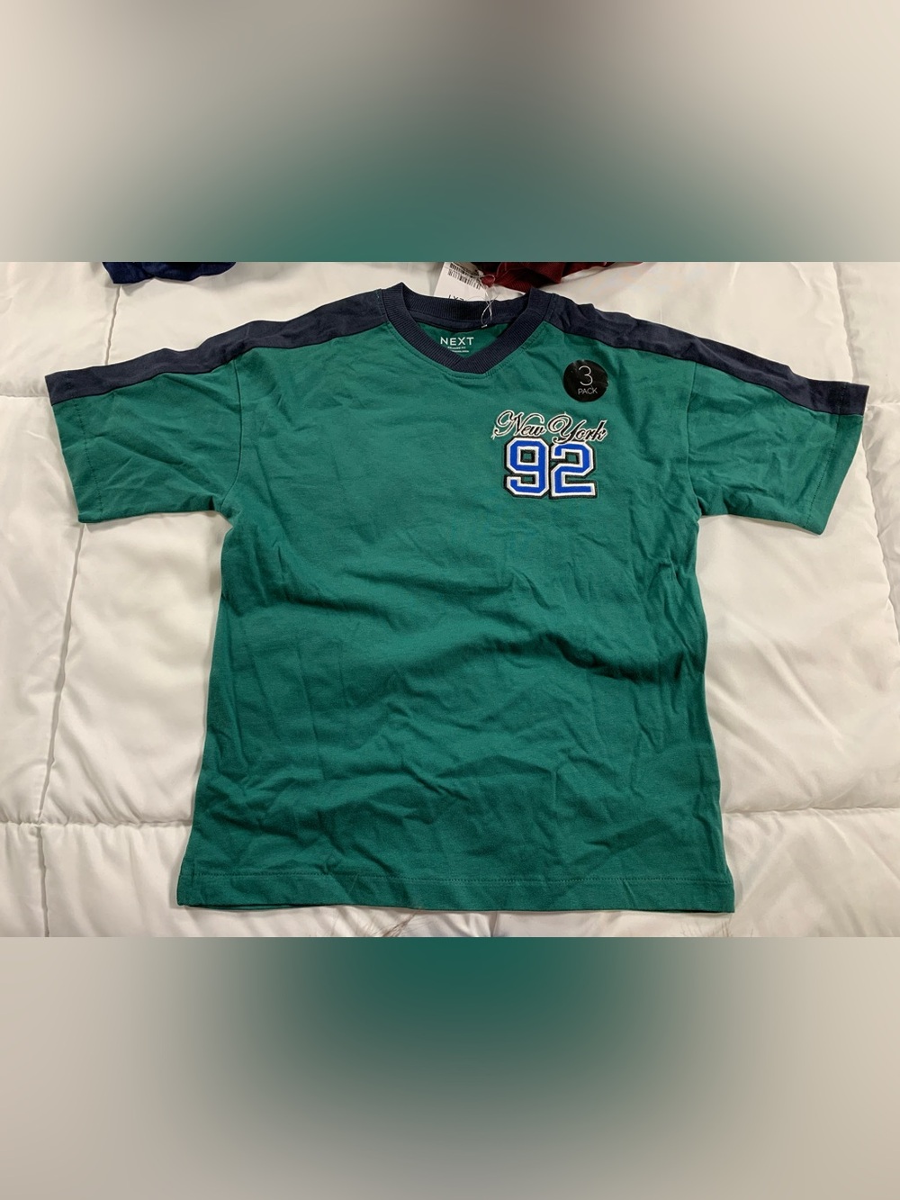 New next three pack relaxed fit T-shirts size 7Y